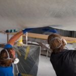 große Bahnen muss man zu zweit anbringen