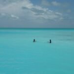 Netzfischer waten hinter Belena